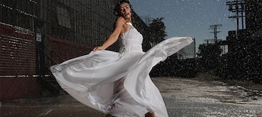 Example image of a woman dancing in the rain