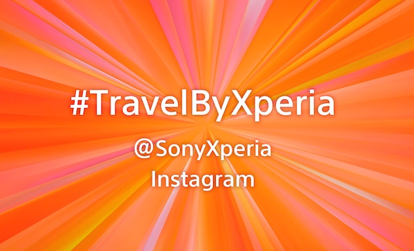 #TravelByXperia @SonyXperia Instagram on an orange background